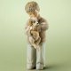 Holding Puppy Boy Figurine by Foundations